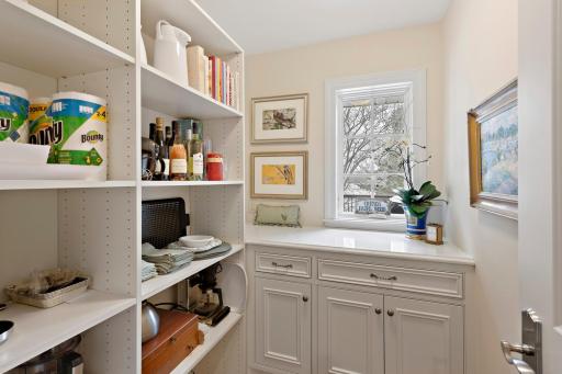 Pantry Off Kitchen. Plumbed For Washer/ Dryer Hookup Inside Lower Cabinet Underneath Shelving