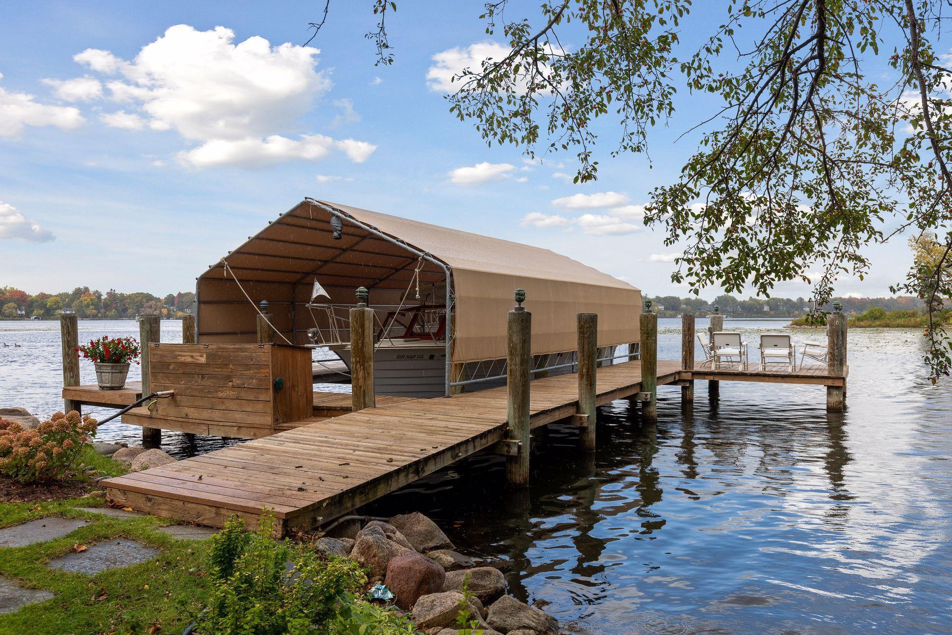 32' permanent dock made of ironwood; electrical power at the dock