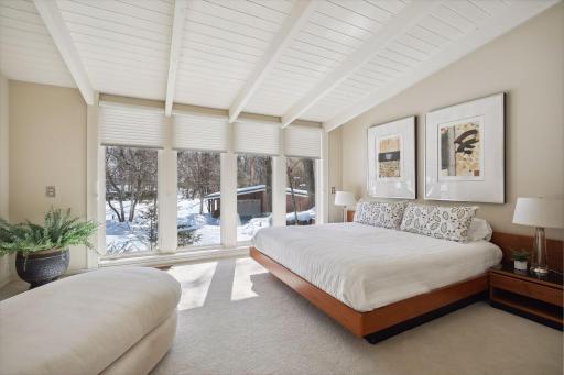 Located on the other end of the upper level is a secondary bedroom with views of the front yard