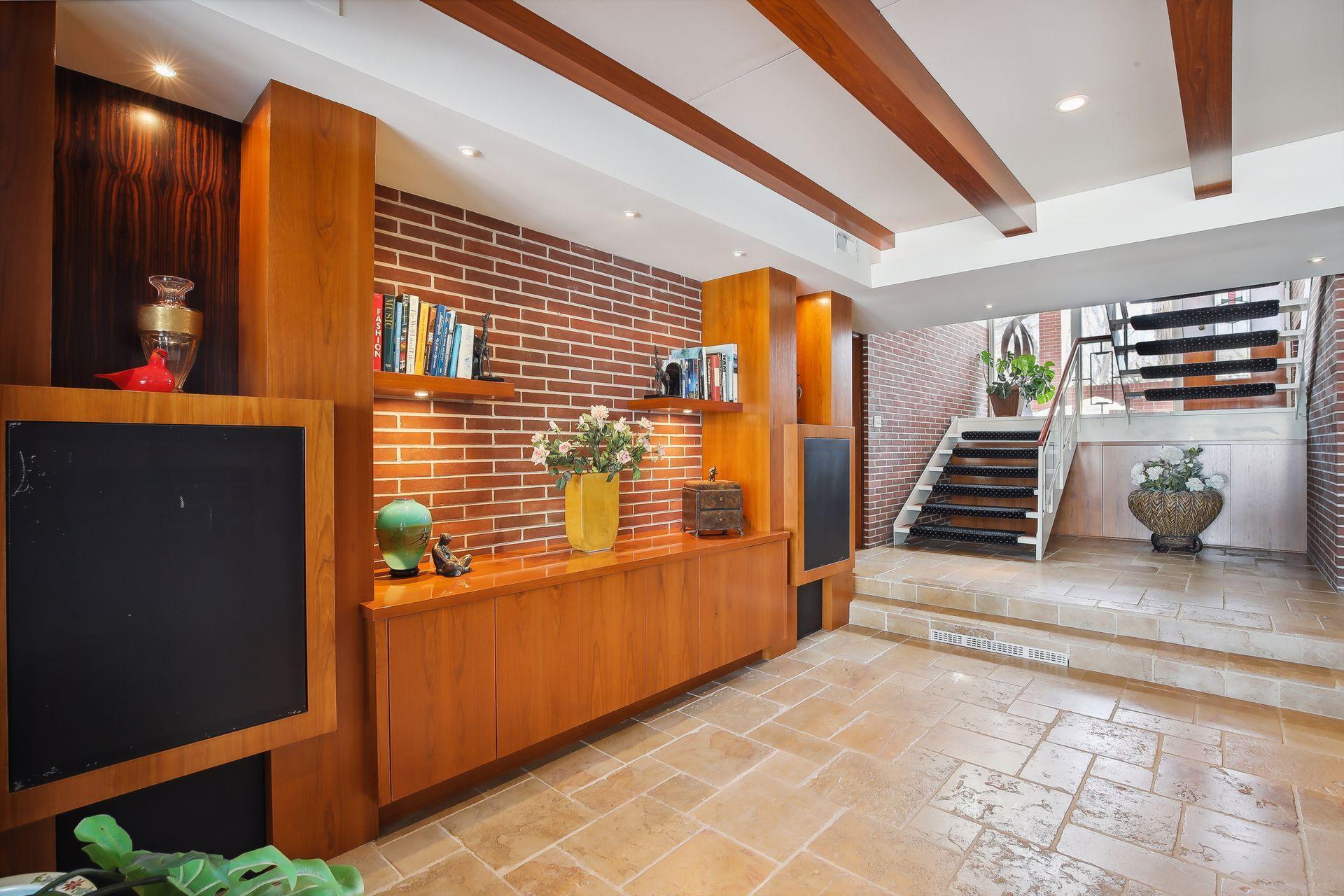 Beautiful warm toned wood creates an inviting feel to this space