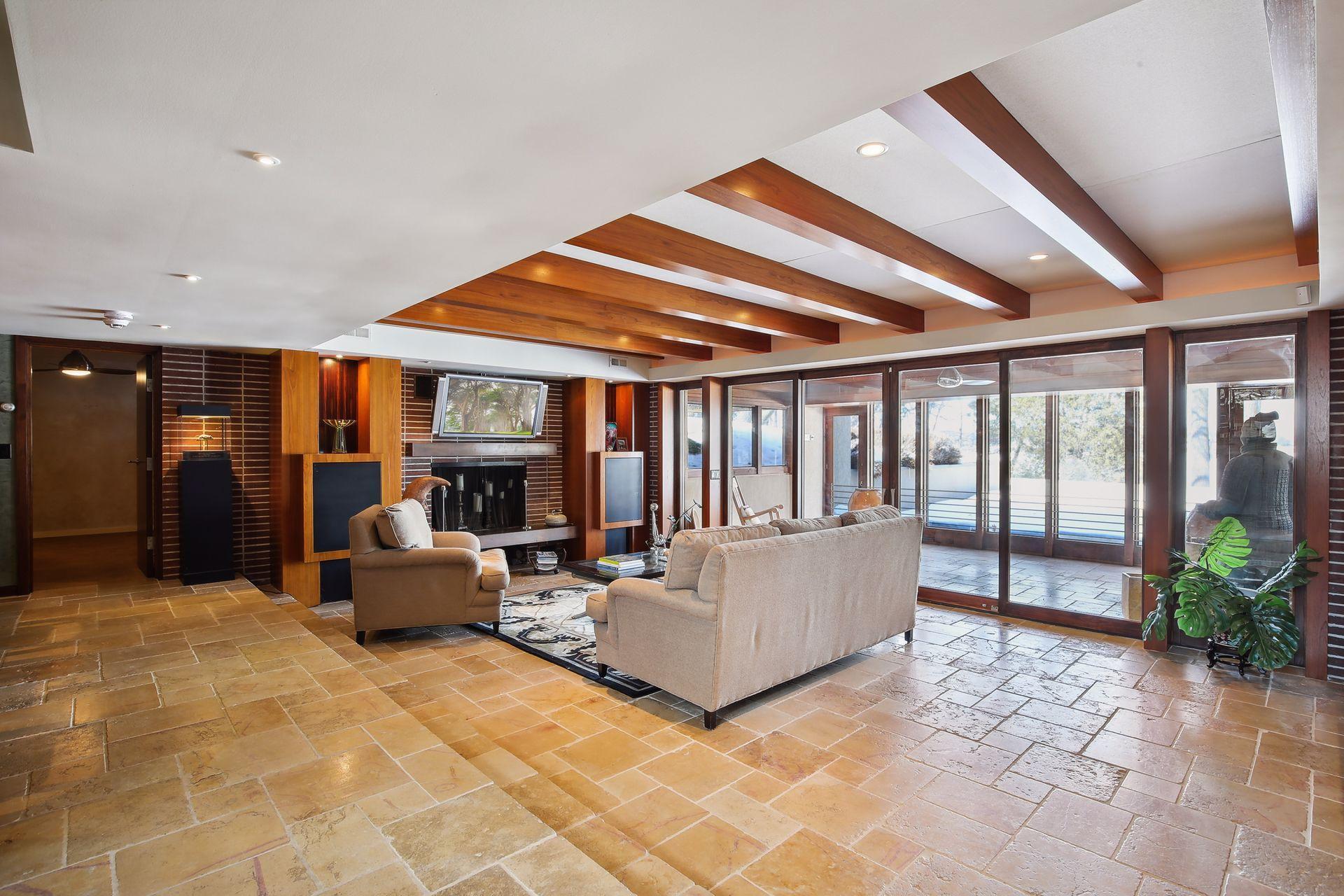 Heated tile floors, fireplace, and built-in cabinets