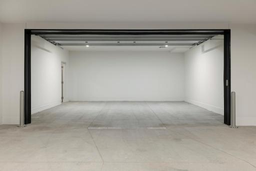 Photo of unit 202 double garage stall - 201 double stall is similar.