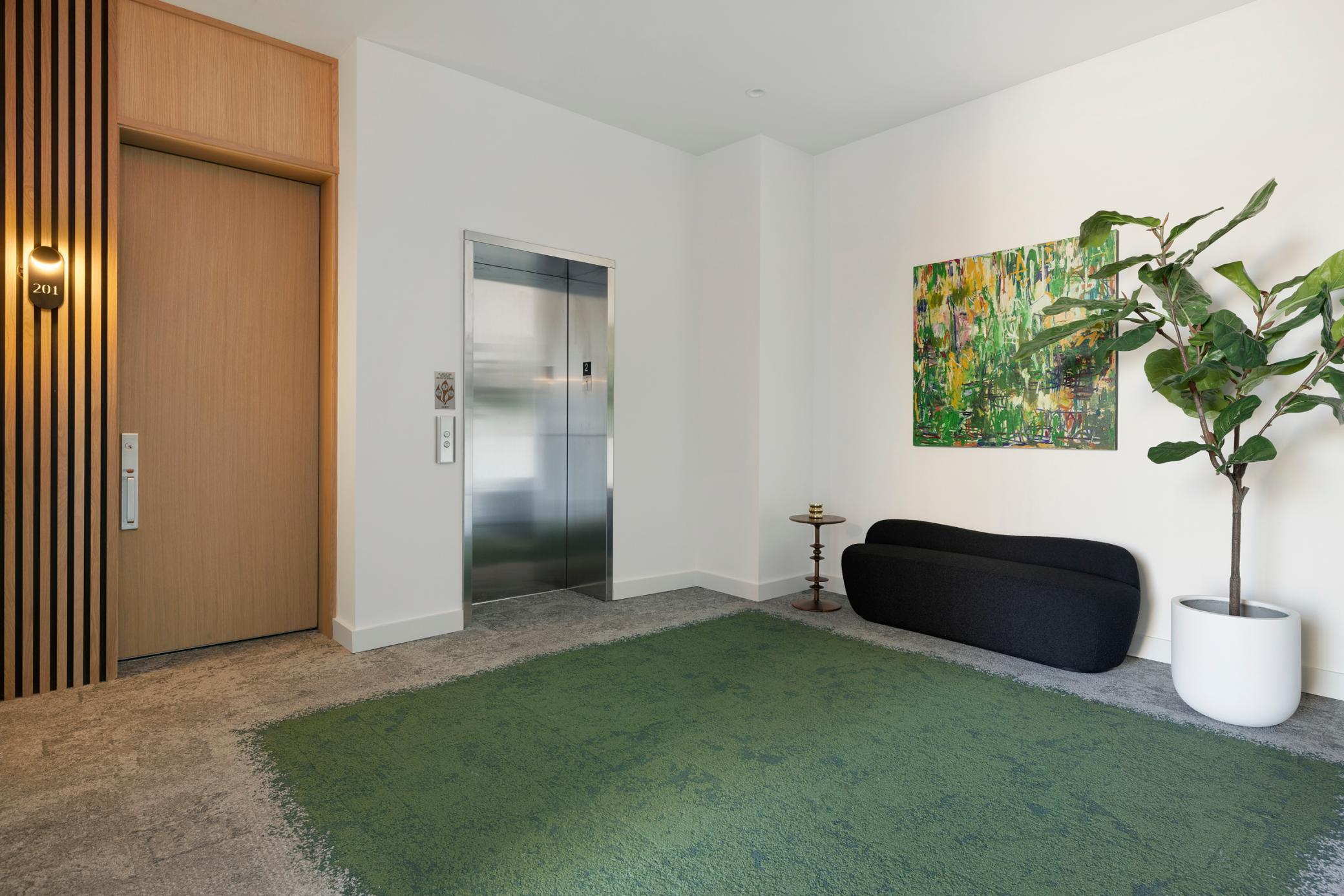 Second floor landing just outside unit 201.