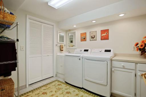 Laundry Room and separate storage room (not pictured). There are two options to move laundry to upper level if desired.
