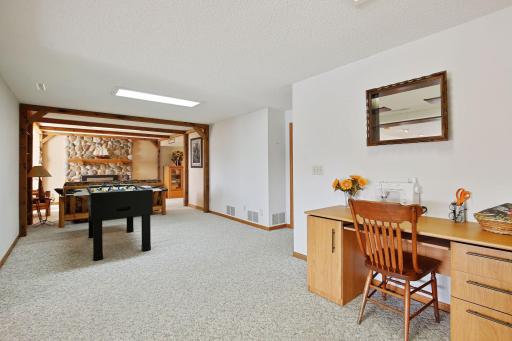 Game Room, and adjacent "man cave" with wood burning fireplace
