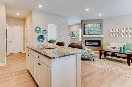 Open floor plan allows ease to talk and entertain (pictures of model home).