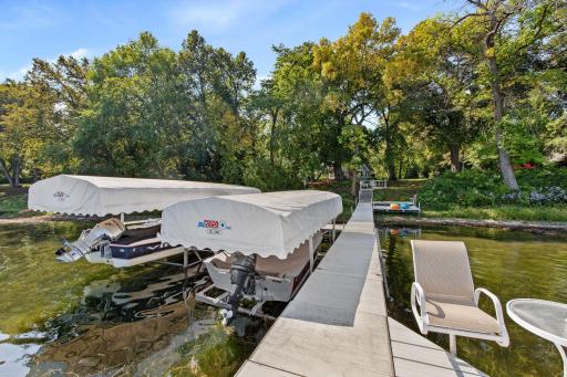 100' Aluminum dock system including 2 boat lifts and kayak launching platform!