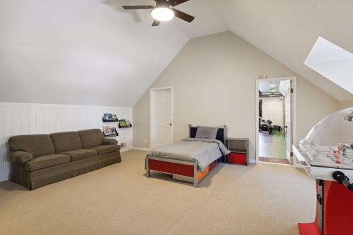 Bedroom #2 located on upper level is a Jr Suite with private, en-suite Bath and connects to Bonus Room.
