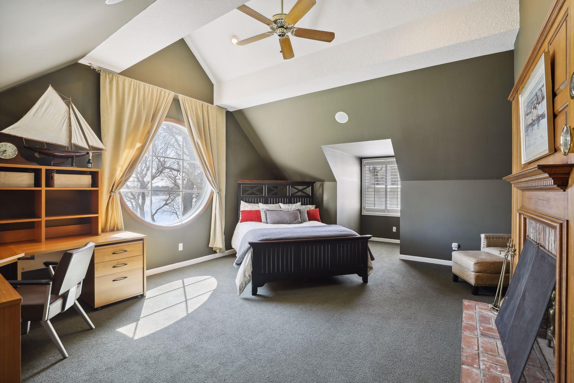 Bedroom # 3 on the upper level with its own fireplace