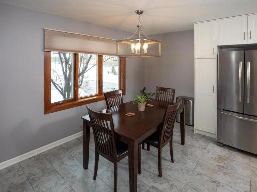 Dining room is open to the kitchen and features great natural light.