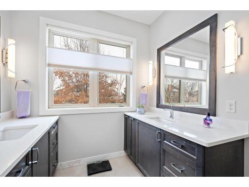 Complete remodel with double vanities, tiled walk in shower and heated floors