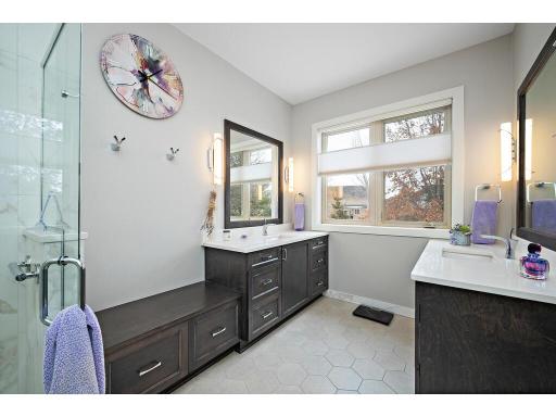 Complete remodel with double vanities, tiled walk in shower and heated floors