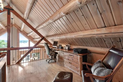 Open to the main level with stunning views, the loft is a perfect place to work or unwind