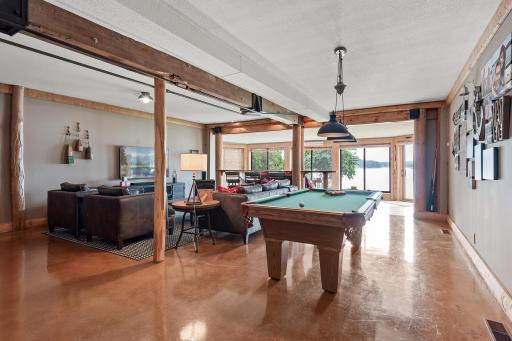 Lower level is set for entertaining large or small groups! Family room with gas fireplace, game area and sunroom.