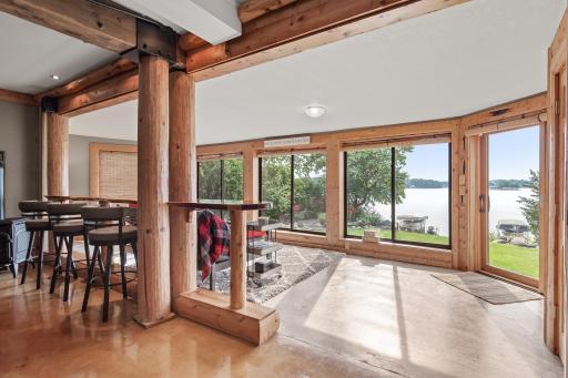 Sunroom walks out to backyard and lake fun!