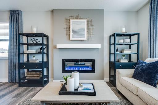 One of many highlights in the main level, the homes fireplace offers a touch of modernization of a space already loaded with a contemporary layout!