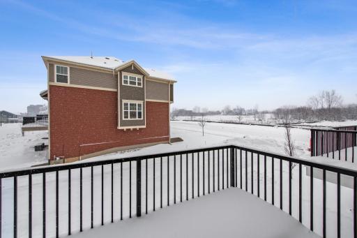 Private deck located off the kitchen. Photos not of actual home. Actual home will be similar floorplan; some colors and features may vary.