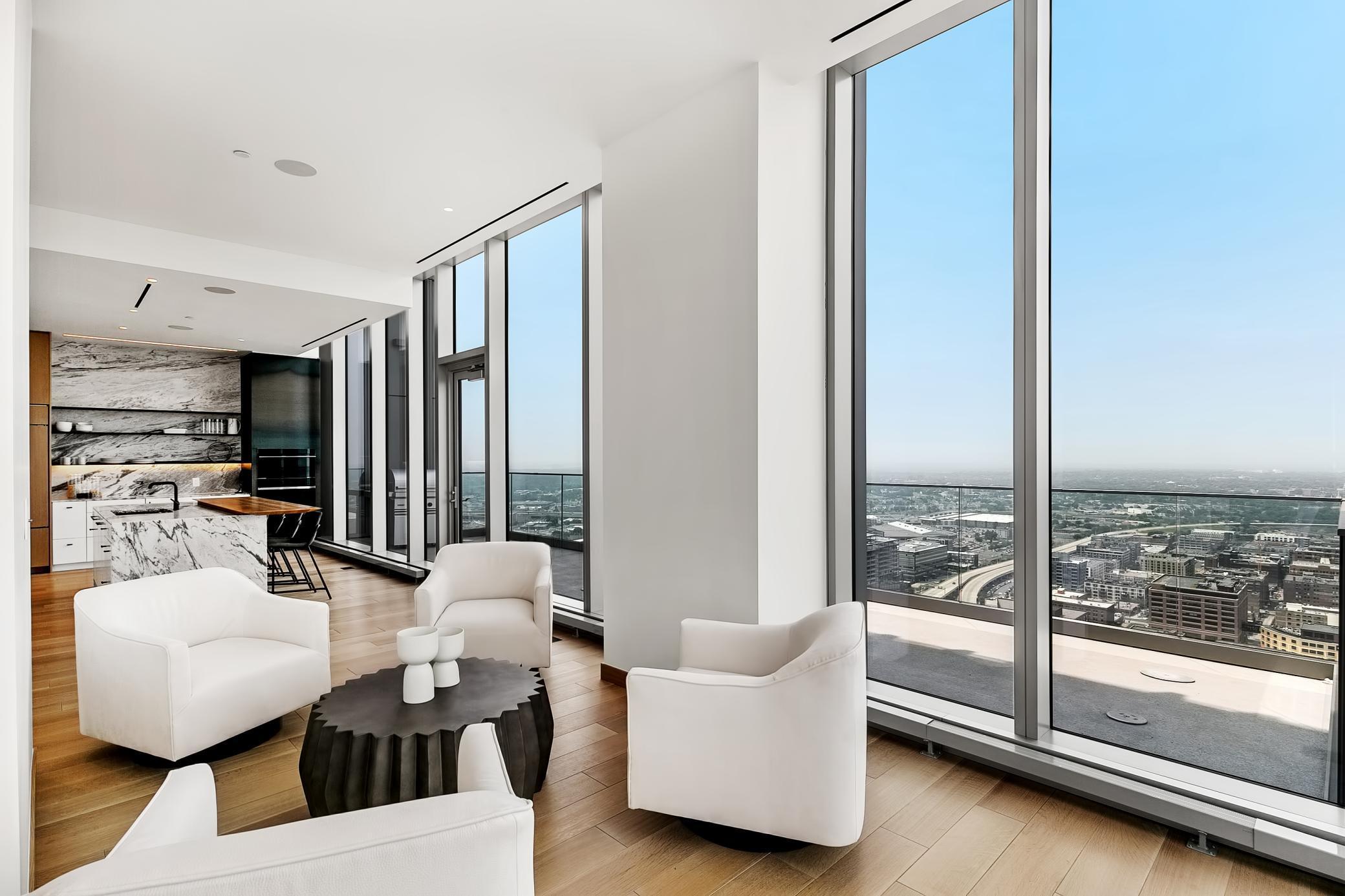 Timeless, modern, warm, & inviting world-class design & distinctive details. Indoors & outdoors merge harmoniously from the living space to the two private terraces.