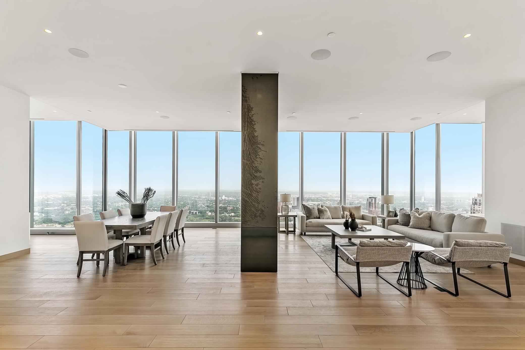 Unparalleled river & skyline views! Stunning Oak floors, amazing open concept floor plan and cozy fireplace. Impeccable two-sided fireplace, panoramic views for miles and miles and incredibly functional spaces all on one level.