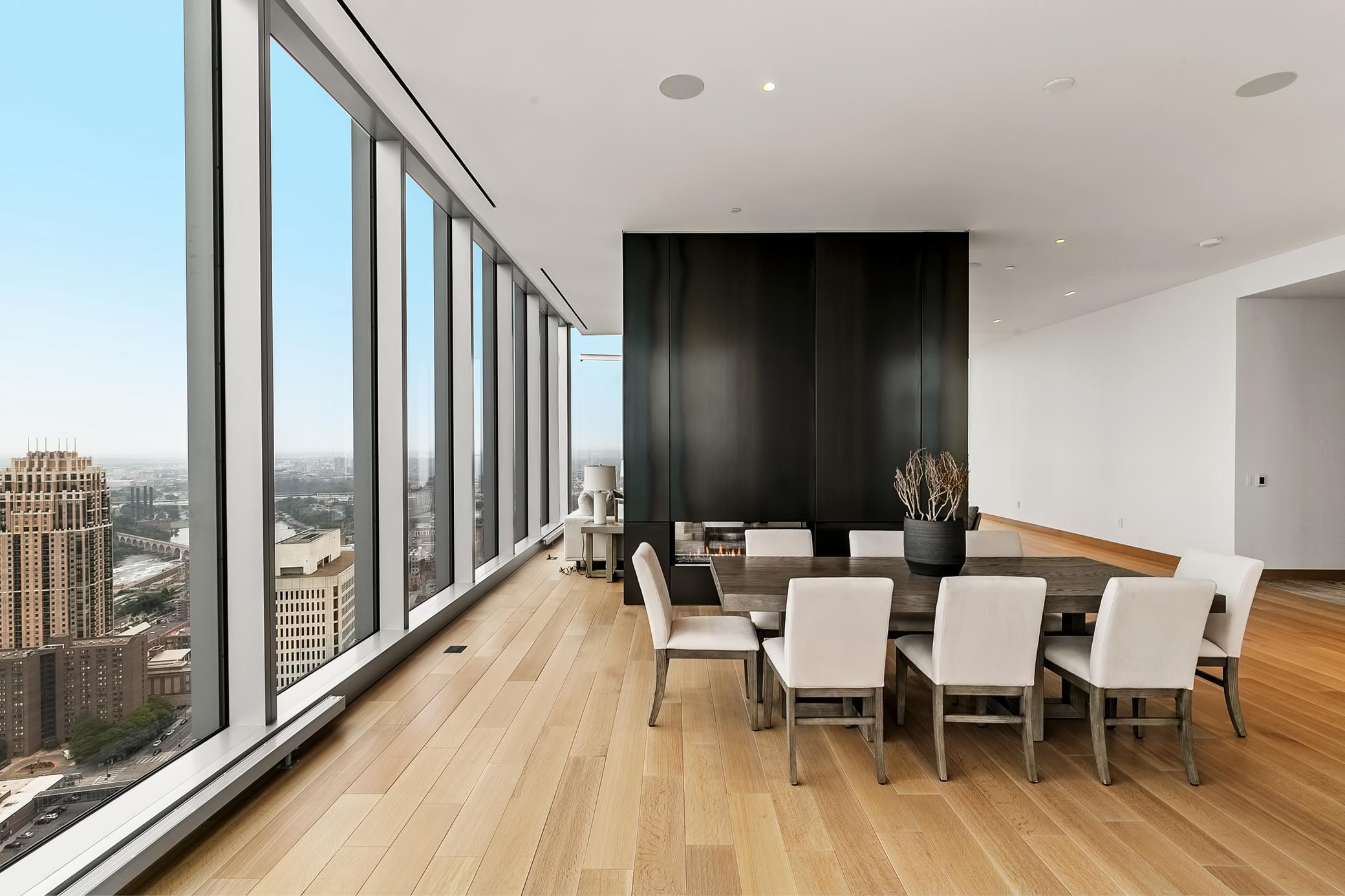 Cozy floor to ceiling fireplace with views for miles and miles - you'll never get sick of this view.