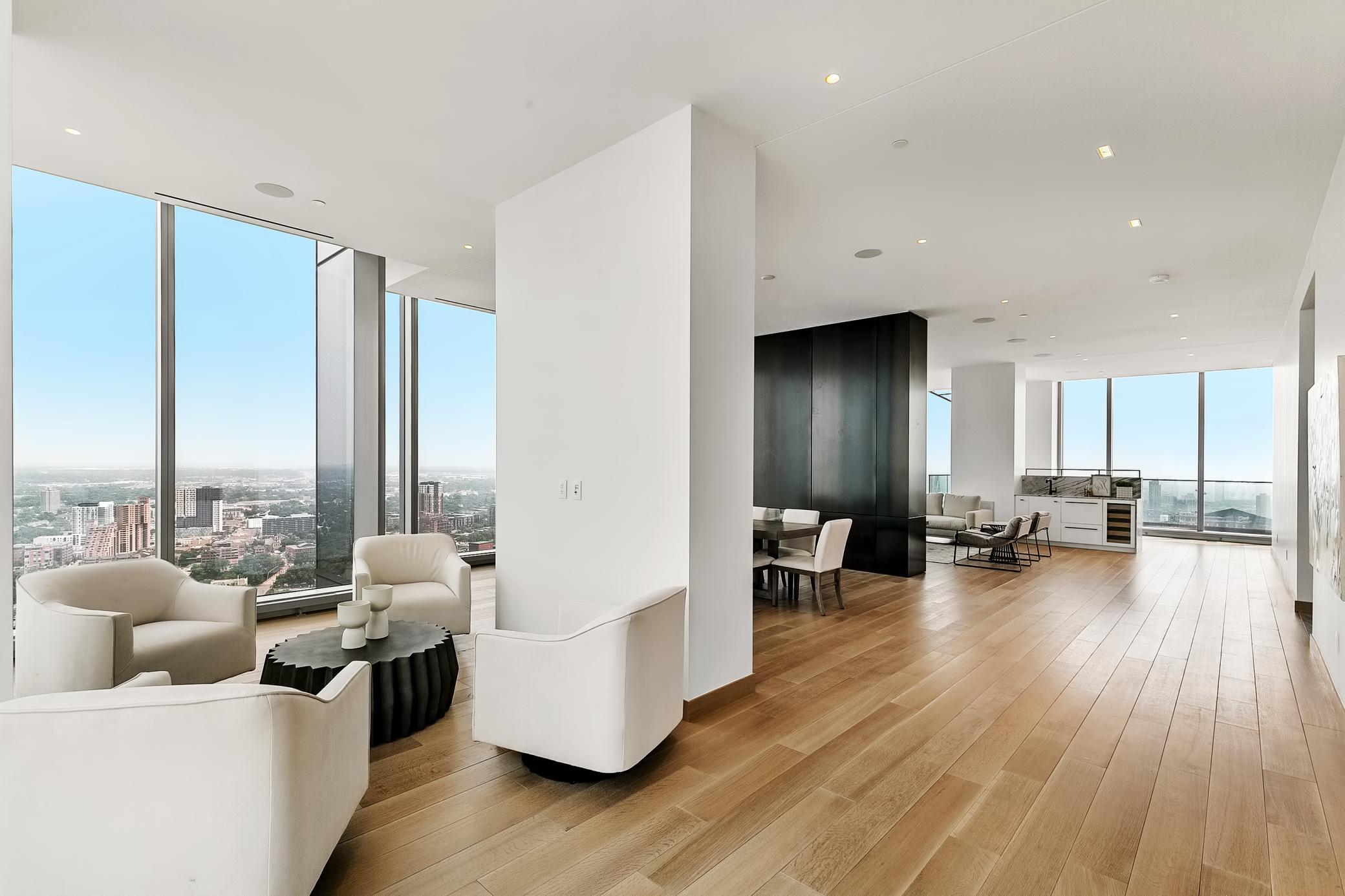 Open concept living at its finest! Wonderful wet bar area with additional dishwasher and views for miles and miles