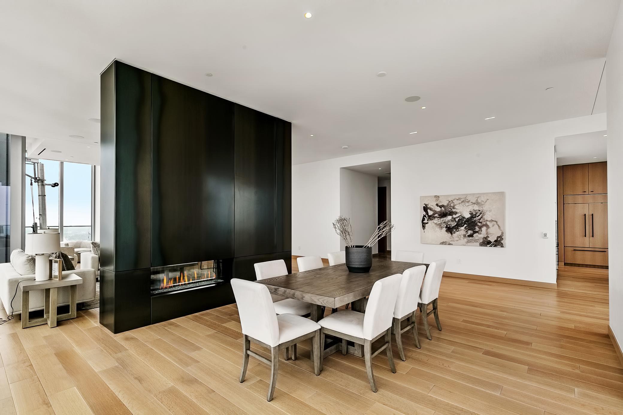 Panoramic views with floor-to-ceiling windows that will simply take your breath away. Cozy dining room space with welcoming fireplace