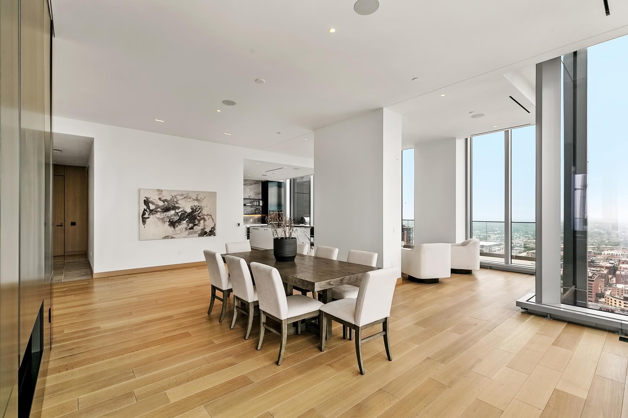 Gleaming hardwood floors, ceiling-mounted speakers connected to A/V Infrastructure