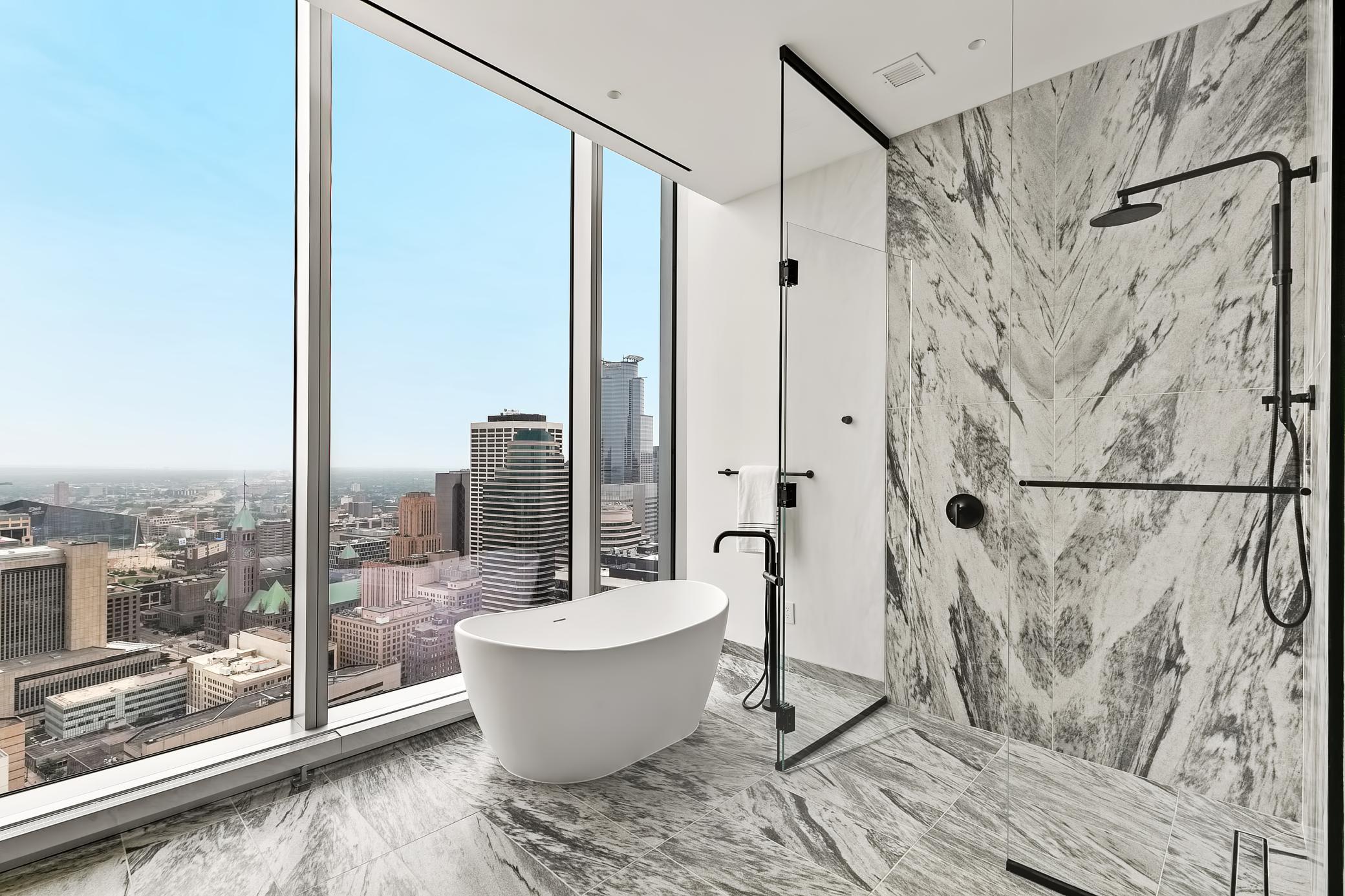 Primary full Bath with large walk-in shower and double marble vanity