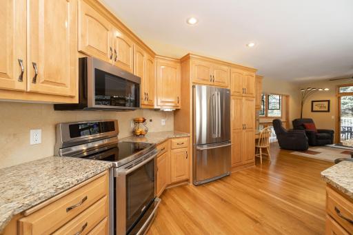 Stainless steel appliances and wood floors
