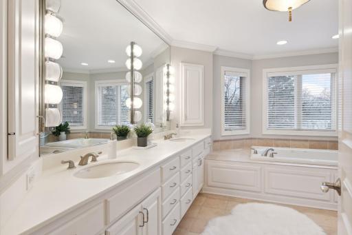 Ensuite bath includes tub, separate walk-in shower and water closet