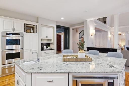 Cooks kitchen complete with double oven, two dishwashers, two sinks and pantry