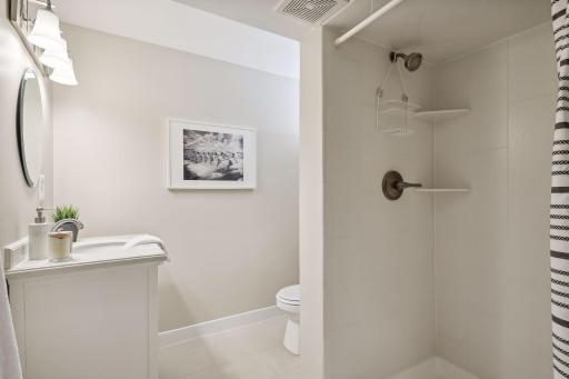 Lower level finished 3/4 bathroom.