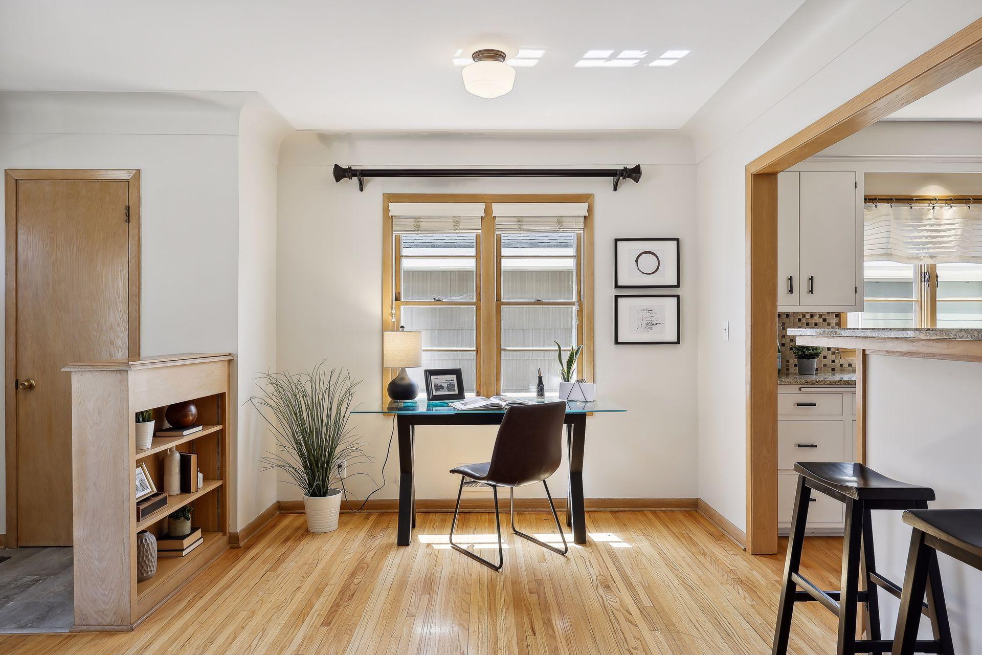 Bright and airy with many updated windows and Hunter Douglas blinds.