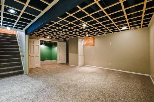 Double doors open to home office or potential 3rd bedroom.