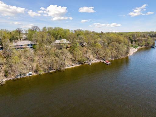 Walls of windows overlook the lakeshore