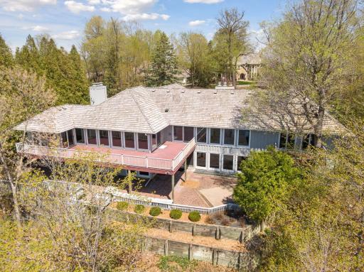 Walls of windows and abundant outdoor living/entertaining space