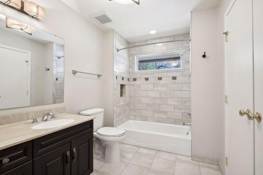 Part of the addition, the en-suite fall bath features a cedar closet