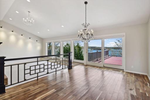 Dining room boasts gorgeous cherry hardwood floors and opens to easy outdoor entertaining