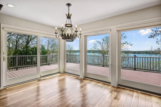 Wrap around deck with access from the kitchen/great room, dining room and sun room