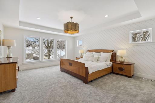 Large praimary suite with plenty of windows. Photos are from a previously built home.