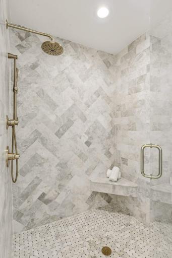 Custom marble shower. Photos are from a previously built home.