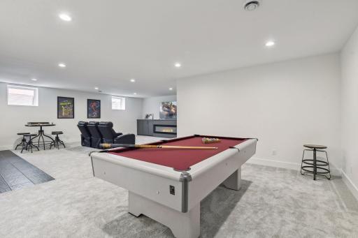 Large lower level is greate for entertainment. Photos are from a previously built home.