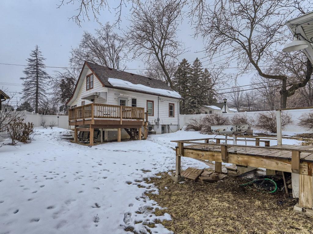 17 Another view of the backyard with many perennials and a great deck AND patio of the side of the home. .jpg