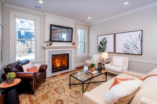 Main floor family room with gas fireplace.