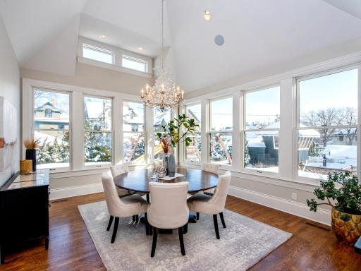 Informal dining area with 14' vaulted ceiling.