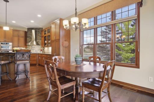 The gourmet Kitchen includes and eat-in Dining Area with large window wall for enjoying the wooded views.