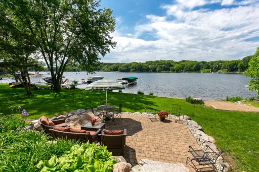 Welcome to your dream lake house on highly desired fully recreational Lake Riley! Enjoy 100-ft of PRIVATE lvl lakeshore, your own sandy beach, lakefront patio & maint-free dock!