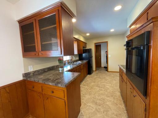Kitchen features New flooring ,counters, sink/faucet, electric stove with fan/light .exhaust hood New LED lighting too!