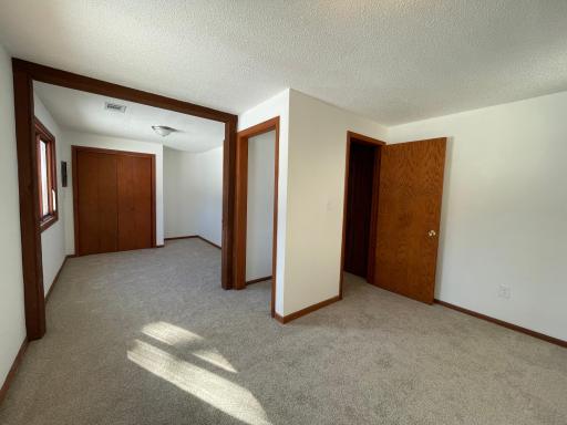 Lower level used to have two bedrooms . Current 4th bedroom wall was opened up to make a larger bedroom.
New carpet in bedroom & freshly painted.