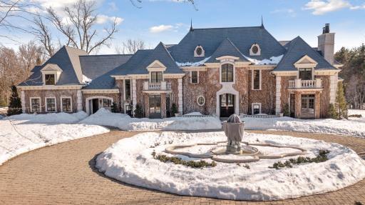 Introducing 1200 Old Crystal Bay Road in beautiful Orono, Minnesota. Nestled on 2.55 private acres, this exquisite French Chateau boasts five bedrooms and eight bathrooms across 11,339 finished square feet.